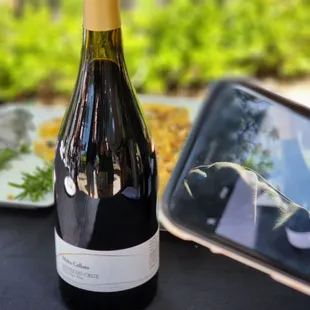 a bottle of wine on a table