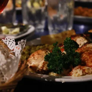 a plate of food and a glass of wine