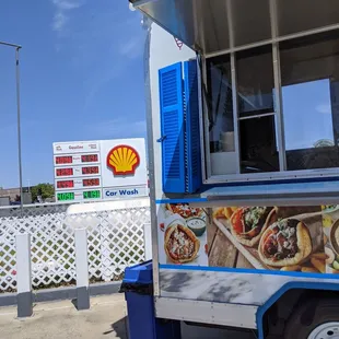 Located at the Shell gas station