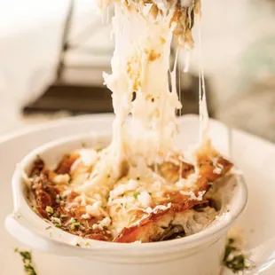 Mousakka-vegetarian traditional baked casserole with zuccihini,potato,eggplant,tomato &amp; bechamel