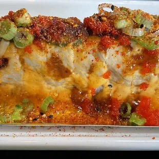 Dynamite Roll-- we had already started eating some pieces-- it was so delicious!