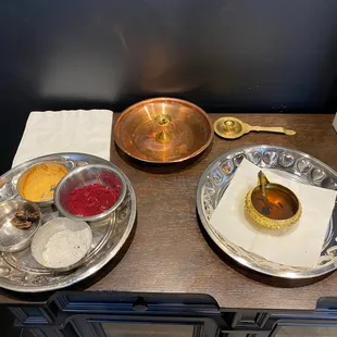 a table with bowls of food on it