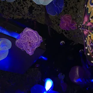 the ceiling decorated with flowers and butterflies