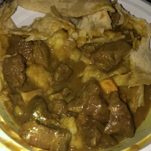 Curry goat roti