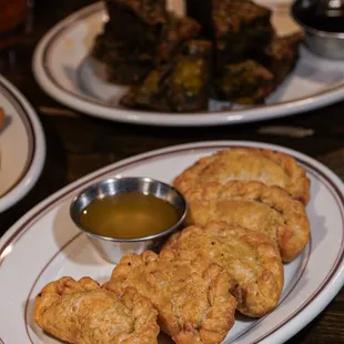 three plates of food on a table