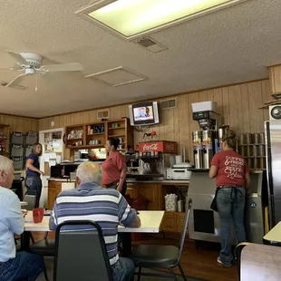 a group of people in a restaurant