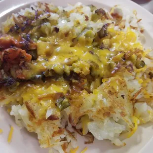 Hashbrown scramble with cheese, tomatoes, and peppers