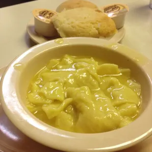 a bowl of soup and bread