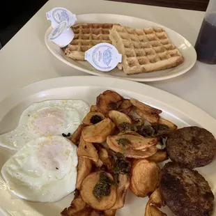 a breakfast of waffles and eggs