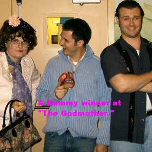 three people posing for a picture