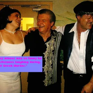 a man and two women laughing