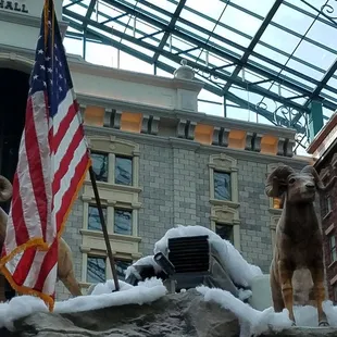 Old Glory and big horn sheep bring on the Christmas and Holidays Season in December 2021 on top of the Big Horn Bar.