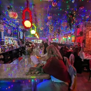 people sitting at the bar