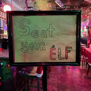 a sign that says, seat your beer
