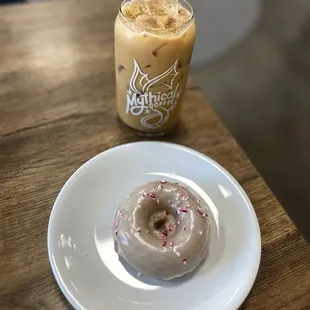 a frosted donut and iced coffee