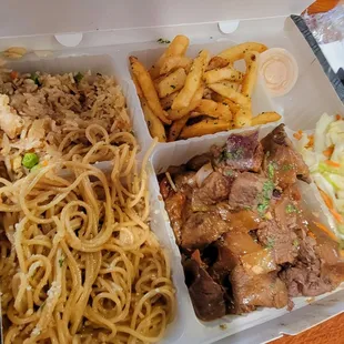 Fried rice, garlic noodles, lomo saltado, French fries, salad.