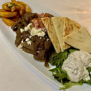 Gyro Platter - Thin sliced gyro meat, tomato brunoise, feta cheese w/ tzatziki sauce, potato fries, pita bread