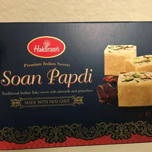 Soan papdi- do give this sweet a try, very sweet, flaky, lovely flavor of cardamom, what&apos;s not to love about it?