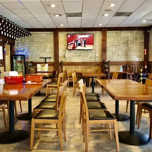 a restaurant with tables and chairs