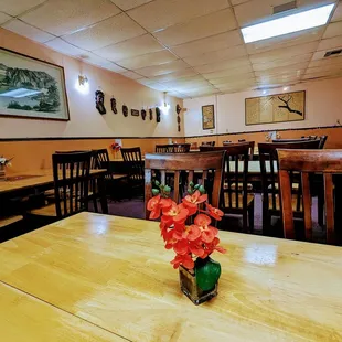 a table with a vase of flowers on it