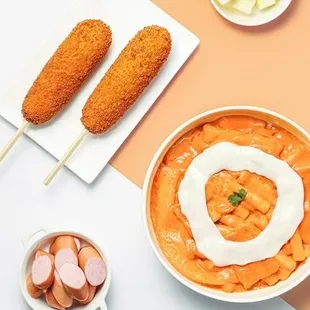 Kiorean Tteokbokki.  We cook it when order and you can picky from Spicy or Rose (Less spicy and creamy) Come and Give it a try!