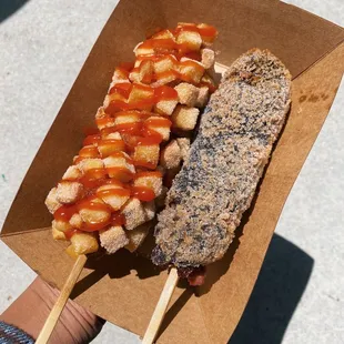 potato sausage/mozzarella with ketchup, squid ink sausage/mozzarella