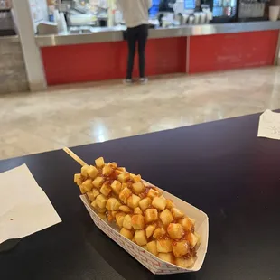 Potato covered hot dog