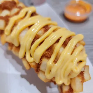 Potato dog with nacho cheese topping. Yummmm