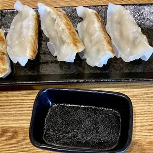 Gyoza was nicely grilled with a sauce on the side.