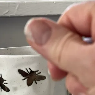 Nov 2024 again nail split down side. Liquid bandaged to help support.