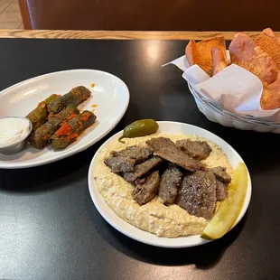 Grape leaves and the small hummus topped with gyro meat