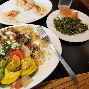 Gyro platter with rice and grilled veges. Tabouli and hummus.