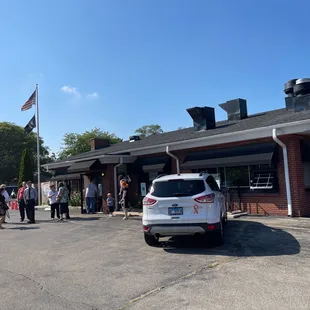 a group of people standing outside