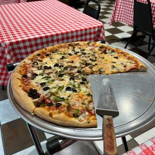  a slice taken out of the pizza