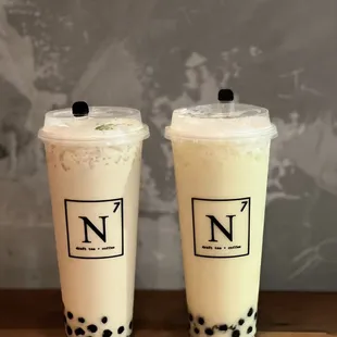 house milk tea on the left and jasmine nitro milk tea on the right!