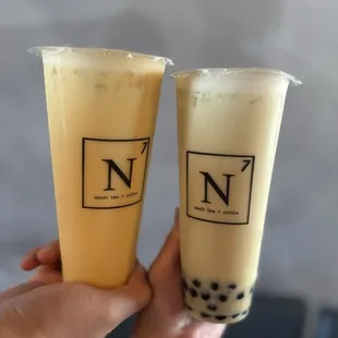 Mango milk tea (left) and jasmine milk tea with boba (right)