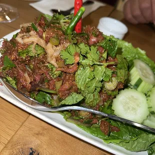 Raw beef laab (spicy and bitter)