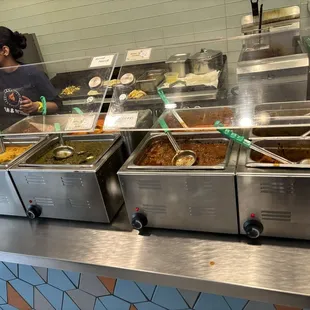 Vegetarian in left and meat curries in right