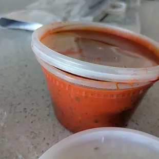 Partially open container