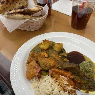 Buffet plate and drinks, naan bread