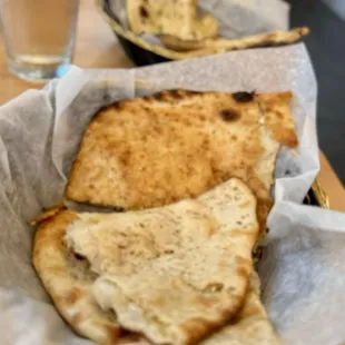 Garlic naan in back. And the raisin and cashew naan up close (I forgot the name).