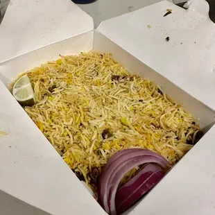 Half order of biryani spread in the to go box..!!