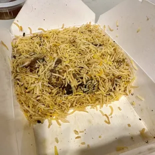 Half order of biryani spread in the box