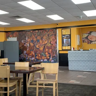 Lovely colorful mural.  Comfortable seating.