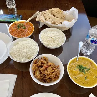 Veggie pakora, shrimp curry, special lamb vindaloo, tandori roti and basmati rice. Sooooo good, best we&apos;ve had so far.