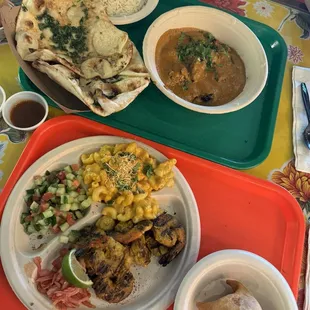 Chicken tikka masala plate and Shrimp Kebab plate with the Tikka Mac &amp; Cheese and Kachumber Salad