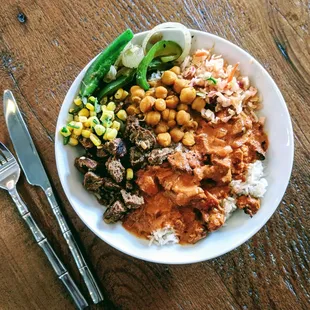 NaanStop Feast (Chicken Tikka Masala, Kabob, Chola) over Basmati Rice