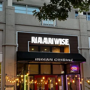 the entrance of a indian cuisine restaurant