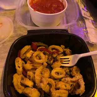 Calamari to go. Not a fan tonight, a little overdone.