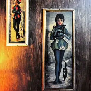 a painting of a woman and a cat